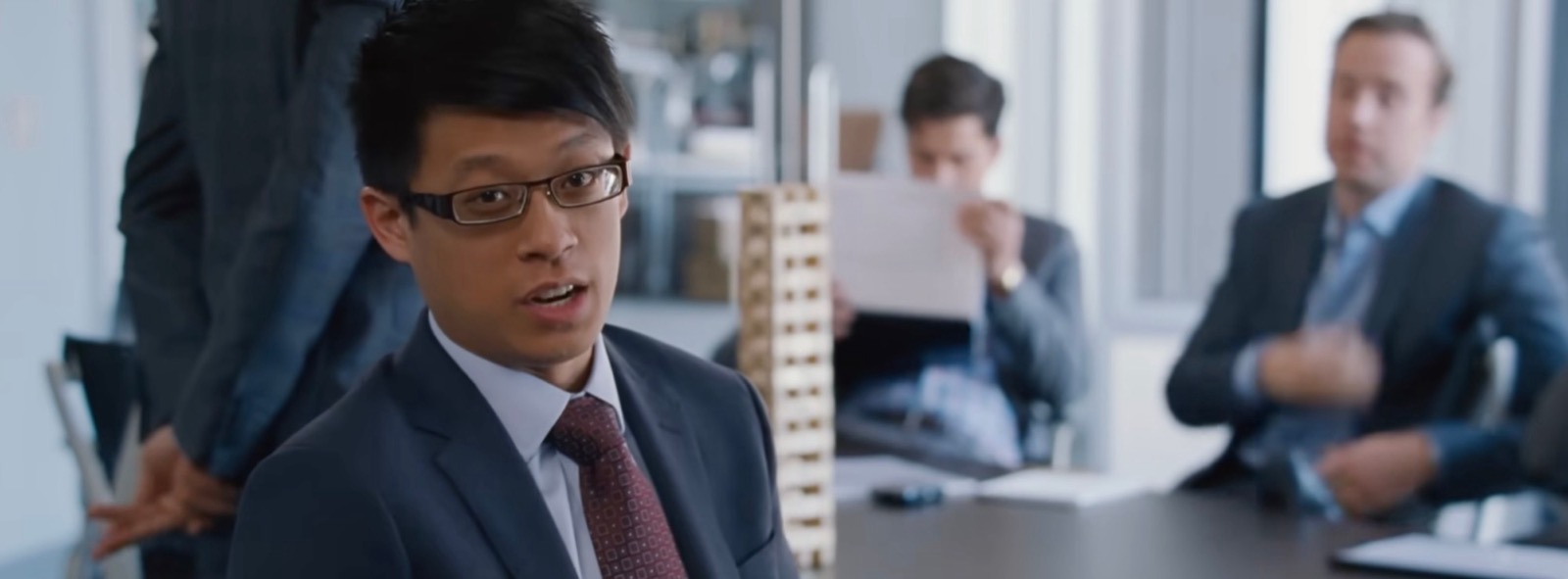 The Big Short: a character turns to camera mid-meeting